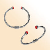 Sterling silver cuff bangle with luminous red coral cabochons and Balinese detailing, handmade in Bali.